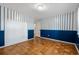 The bedroom features a built-in and blue striped wallpaper at 3494 Cactus St. # 3494, Myrtle Beach, SC 29577