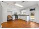 Well-lit kitchen with white cabinetry, stainless steel appliances, and tile flooring at 3494 Cactus St. # 3494, Myrtle Beach, SC 29577