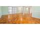 Bright living room with beautiful parquet floors and natural light from multiple windows at 3494 Cactus St. # 3494, Myrtle Beach, SC 29577