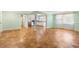 Spacious living area that is connected to the kitchen, featuring hardwood floors at 3494 Cactus St. # 3494, Myrtle Beach, SC 29577