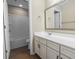 Well-maintained bathroom with storage vanity, countertop, and tub at 3659 White Wing Circle, Myrtle Beach, SC 29579