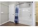 Bathroom with a white tiled shower/tub combination and modern fixtures at 3659 White Wing Circle, Myrtle Beach, SC 29579