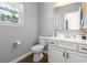 Bright bathroom with granite countertops, and great natural light at 3659 White Wing Circle, Myrtle Beach, SC 29579