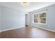Cozy bedroom features a window, neutral paint, and laminate flooring at 3659 White Wing Circle, Myrtle Beach, SC 29579