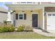 Charming front porch with decorative plants and stone accents, creating a welcoming entrance to the home at 3659 White Wing Circle, Myrtle Beach, SC 29579