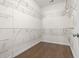 Spacious walk-in closet with ample shelving and wood-look floors at 3659 White Wing Circle, Myrtle Beach, SC 29579