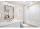 Bathroom featuring a shower-tub combo, white vanity, neutral walls, and a decorative framed mirror at 381 Da Gullah Way # 8 B, Pawleys Island, SC 29585