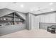Neutral bedroom offers ample storage with custom built-in shelving and bright, natural light at 381 Da Gullah Way # 8 B, Pawleys Island, SC 29585