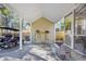 Well-maintained carport with storage and convenient access to the screened porch at 381 Da Gullah Way # 8 B, Pawleys Island, SC 29585