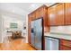 Modern kitchen with stainless steel appliances, granite countertops, and hardwood floors at 381 Da Gullah Way # 8 B, Pawleys Island, SC 29585
