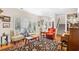 Spacious living room with natural light, hardwood floors, and comfortable seating arrangements at 381 Da Gullah Way # 8 B, Pawleys Island, SC 29585