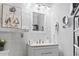 Stylish bathroom featuring a vanity with ample storage, an elegant mirror, and modern fixtures throughout at 413 Chesterfield Ct., Myrtle Beach, SC 29577