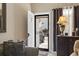 Cozy entryway showcasing a well-lit interior with dark wood furniture and neutral walls at 413 Chesterfield Ct., Myrtle Beach, SC 29577