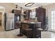 Spacious kitchen with stainless steel appliances, granite island, and modern cabinetry at 413 Chesterfield Ct., Myrtle Beach, SC 29577