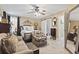 Comfortable main bedroom featuring a sliding barn door to the ensuite bath at 413 Chesterfield Ct., Myrtle Beach, SC 29577