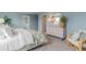 Aesthetic bedroom showcasing a large bed, dresser, and a cozy chair, all complemented by soft, natural light at 414 Acosta Circle, Conway, SC 29527
