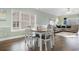 Dining area adjacent to living room with modern chair set at 4141 Hibiscus Dr. # 201, Little River, SC 29566