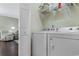 Laundry room featuring a washer and dryer with view to adjacent living area at 4141 Hibiscus Dr. # 201, Little River, SC 29566