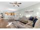 Open floor plan view of living room, kitchen and dining area with hardwood flooring at 4141 Hibiscus Dr. # 201, Little River, SC 29566