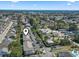 Aerial view showcasing the property's location near the ocean, lush landscapes, and neighborhood amenities at 4155 Hibiscus Dr. # 204, Little River, SC 29566