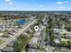 Aerial view showing the property's location with easy access to the lake, neighborhood, and nearby amenities at 4155 Hibiscus Dr. # 204, Little River, SC 29566