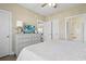 Relaxing bedroom features a dresser with a TV, and an ensuite bathroom at 4155 Hibiscus Dr. # 204, Little River, SC 29566