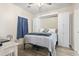Comfortable bedroom features a built-in Murphy bed with storage cabinets and a built-in desk, and hardwood floors at 4155 Hibiscus Dr. # 204, Little River, SC 29566