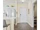 Entryway featuring light wood floors and view of open kitchen at 4155 Hibiscus Dr. # 204, Little River, SC 29566