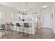 Kitchen view showing kitchen sink, countertops, and barstool seating at 4155 Hibiscus Dr. # 204, Little River, SC 29566