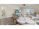 Inviting living room featuring hardwood floors and neutral paint tones with dining area at 4155 Hibiscus Dr. # 204, Little River, SC 29566