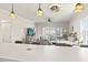 Open-concept living space with kitchen view and recessed lighting at 4155 Hibiscus Dr. # 204, Little River, SC 29566
