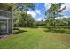 A lush backyard with scenic water views and mature trees offers a tranquil outdoor space at 45 Pinehurst Ln. # 2G, Pawleys Island, SC 29585