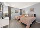 Cozy bedroom featuring two twin beds, light gray walls, and a dresser with a modern television at 45 Pinehurst Ln. # 2G, Pawleys Island, SC 29585