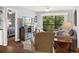 Inviting living room with a balcony view, seamlessly connected to the bedroom, creating a cozy atmosphere at 45 Pinehurst Ln. # 2G, Pawleys Island, SC 29585