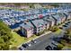 Stunning aerial view of condos, the marina, and waterfront at 4633 Lightkeepers Way # 5H, Little River, SC 29566
