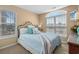 Calm bedroom featuring soft natural light, a ceiling fan, and comfortable furnishings for a relaxing stay at 4633 Lightkeepers Way # 5H, Little River, SC 29566