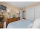 Comfortable bedroom featuring a ceiling fan, TV, and closet space for a relaxing vacation at 4633 Lightkeepers Way # 5H, Little River, SC 29566