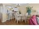 Bright dining area features stylish furnishings and a glass table perfect for casual meals at 4633 Lightkeepers Way # 5H, Little River, SC 29566