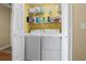 Efficient laundry room featuring a side-by-side washer and dryer for effortless chores at 4633 Lightkeepers Way # 5H, Little River, SC 29566