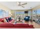 Comfortable living room boasts bright, natural light and great views at 4633 Lightkeepers Way # 5H, Little River, SC 29566
