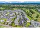 Lovely aerial view of community condos with pool, parking and surrounded by lush landscaping and a golf course at 4865 Magnolia Pointe Ln. # 204, Myrtle Beach, SC 29577