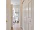 Well-maintained bathroom showcasing tile floors, glass shower, and closet at 4865 Magnolia Pointe Ln. # 204, Myrtle Beach, SC 29577