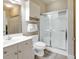 Well-lit bathroom featuring a glass shower, toilet, and vanity at 4865 Magnolia Pointe Ln. # 204, Myrtle Beach, SC 29577