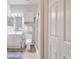 Bright bathroom with tiled floor, glass shower, and modern fixtures at 4865 Magnolia Pointe Ln. # 204, Myrtle Beach, SC 29577