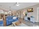 Inviting living room featuring hardwood floors and an open-concept layout connecting to the kitchen at 4865 Magnolia Pointe Ln. # 204, Myrtle Beach, SC 29577