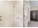 Interior view of entryway with three doors visible and hallway beyond at 500 Fairway Village Dr. # 5D, Myrtle Beach, SC 29588