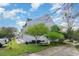 Side view of condo building showing picnic table and lush greenery at 500 Fairway Village Dr. # 5D, Myrtle Beach, SC 29588