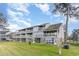 Rear view of condo building showing multiple screened in patios and decks at 500 Fairway Village Dr. # 5D, Myrtle Beach, SC 29588
