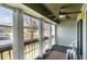 Relaxing screened porch has ceiling fan and an expansive view of backyard trees and the neighborhood at 500 Fairway Village Dr. # 5D, Myrtle Beach, SC 29588