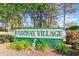 Entrance sign for Fairway Village located near lush trees, shrubs, and a golf course at 500 Fairway Village Dr. # 5D, Myrtle Beach, SC 29588